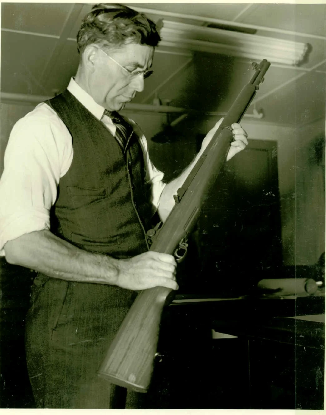 John C. Garand with an M1 rifle