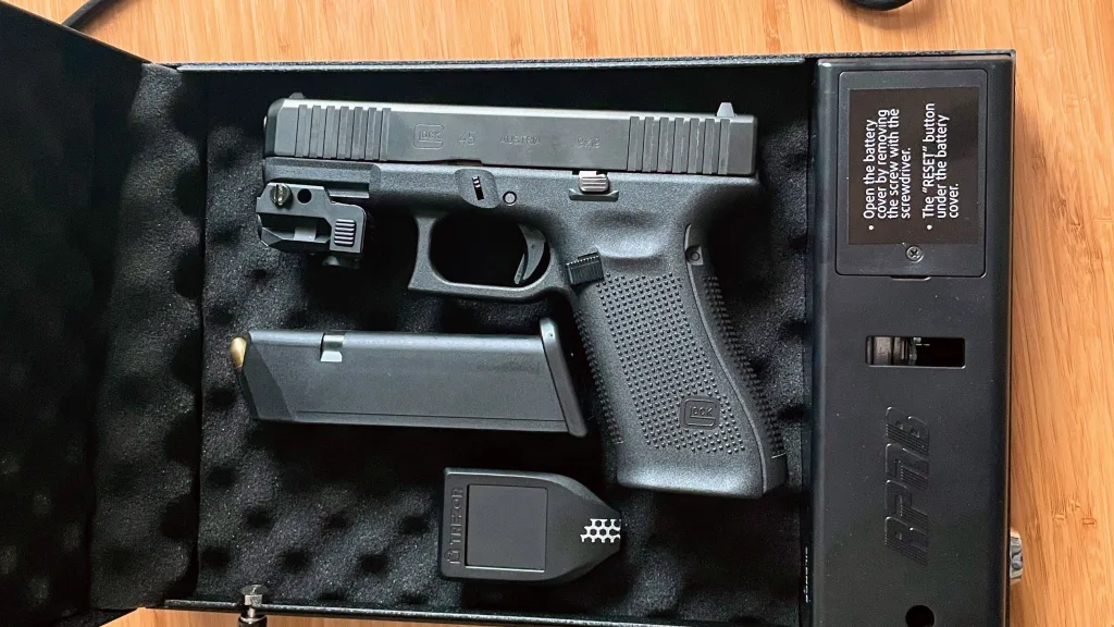 black 9mm glock 45 gen 5 handgun in safe with mag