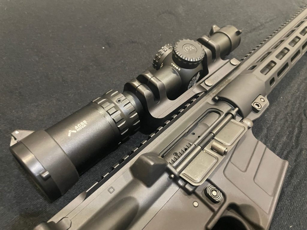 Primary Arms SLx 1-6x24mm SFP Rifle Scope Gen IV - Illuminated ACSS Nova Fiber Wire Reticle - Red Dot Bright® mounted on a Savage MSR15 Recon 2 rifle