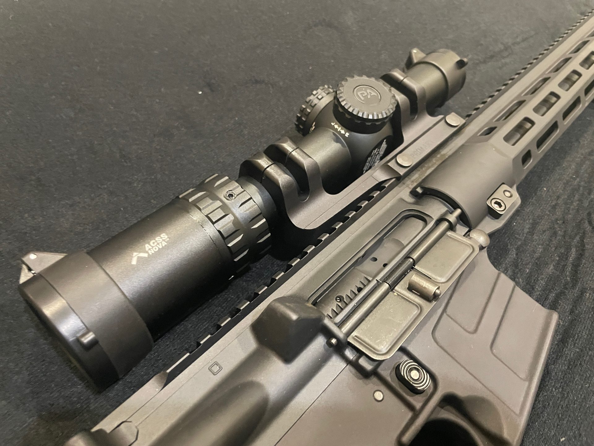 Primary Arms SLx 1-6x24mm SFP Rifle Scope Gen IV - Illuminated ACSS Nova Fiber Wire Reticle - Red Dot Bright® mounted on a Savage MSR15 Recon 2 rifle