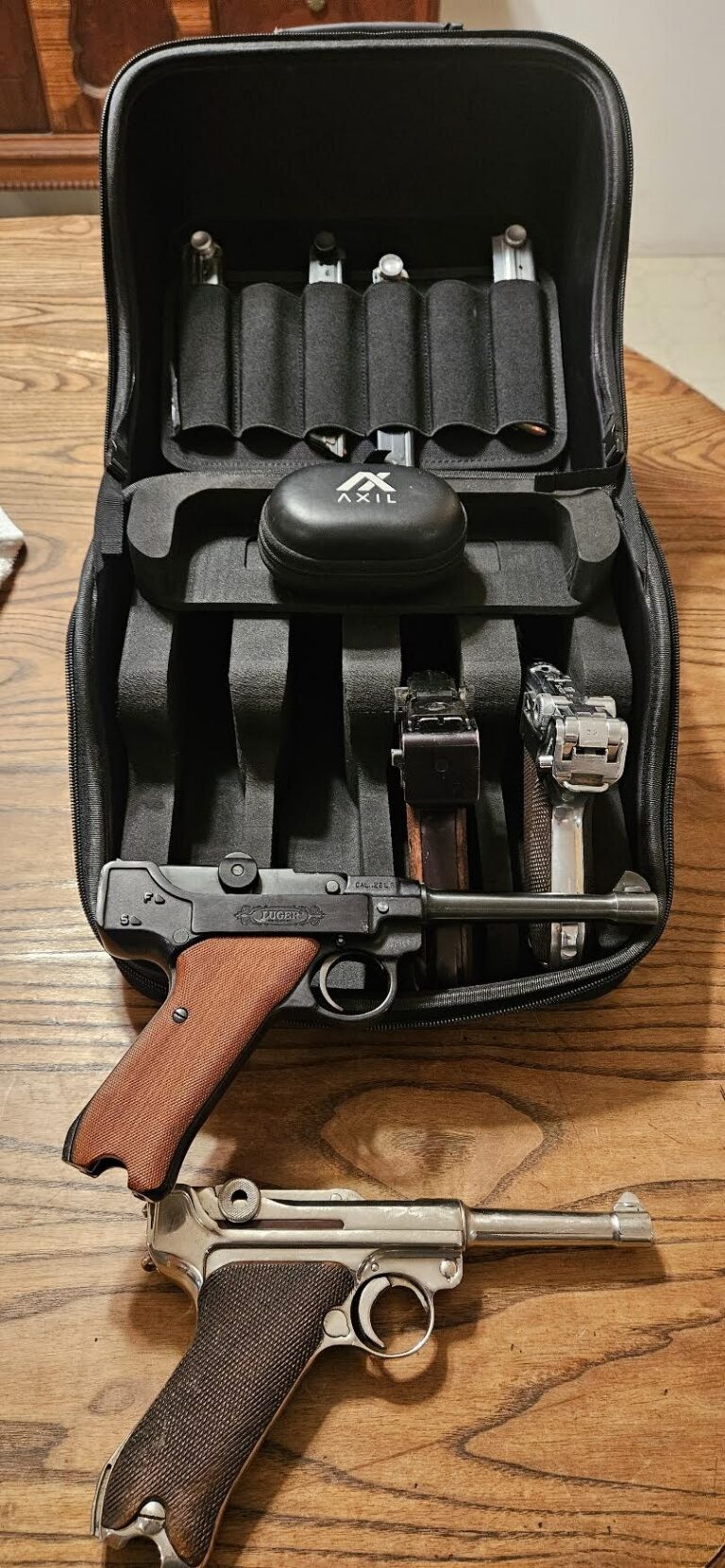 Long-barreled Stoeger 22 LR Luger extending beyond the GRITR Pistol Pod case