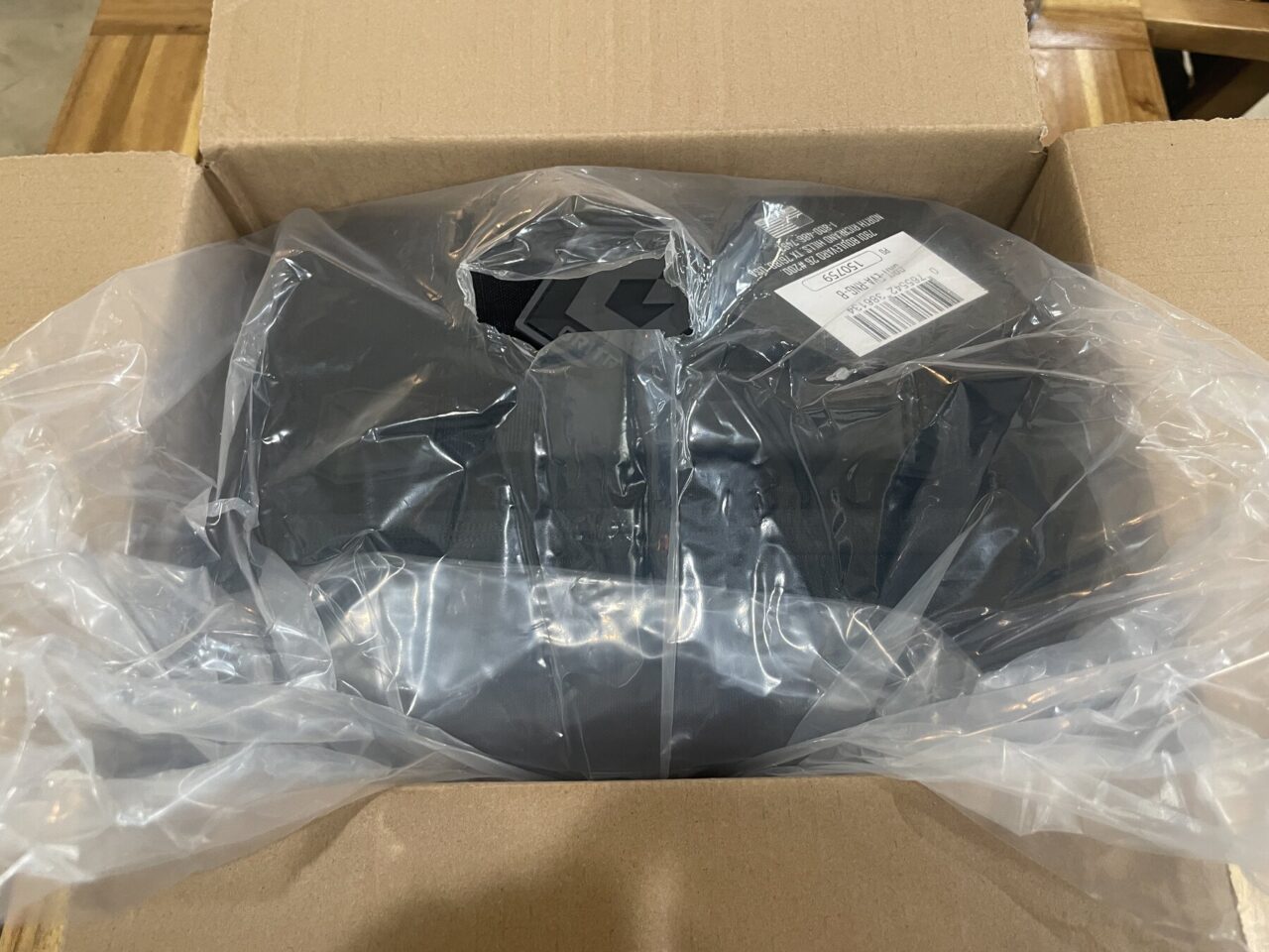 GRITR Pistol Pod inside a clear protective bag within its shipping box