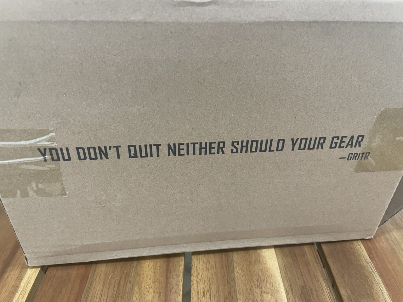 GRITR Pistol Pod shipping box with branded slogan before unboxing